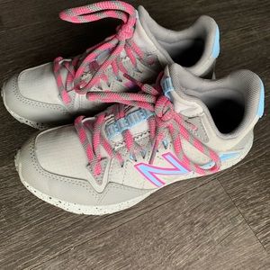 Girls New Balance hiking shoes.